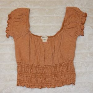 Burnt orange billabong top, size small